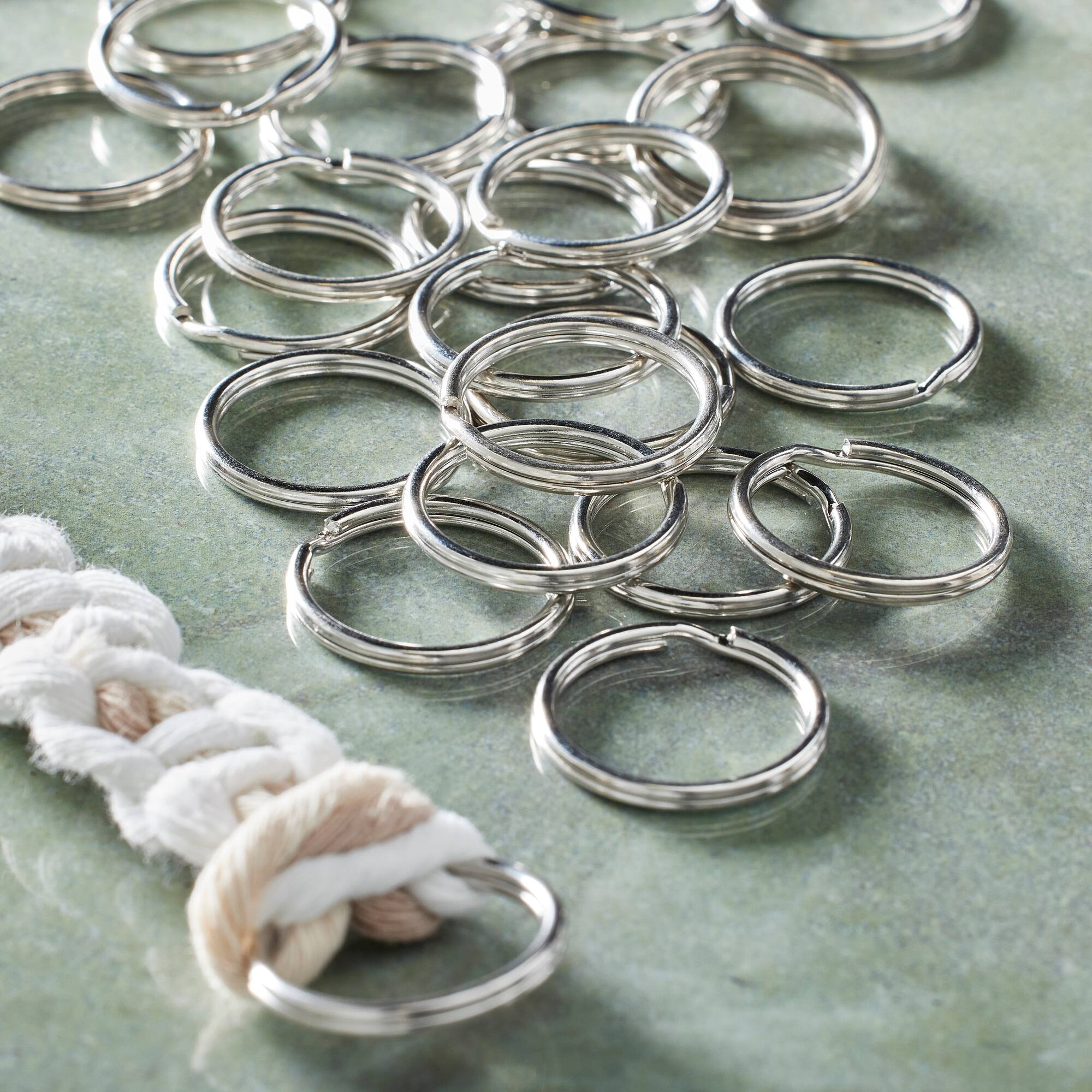12 Packs: 28 ct. (336 total) Rhodium Split Rings, 24mm by Bead Landing™
